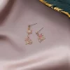 粉櫻鏤空小花扇×不對稱吊墜耳環-第2張