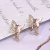 半邊鏤空粉蝶×蚊香盤U型耳夾-第1張