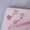 圓粉珍珠&times;蚊香盤U型耳夾-第3張