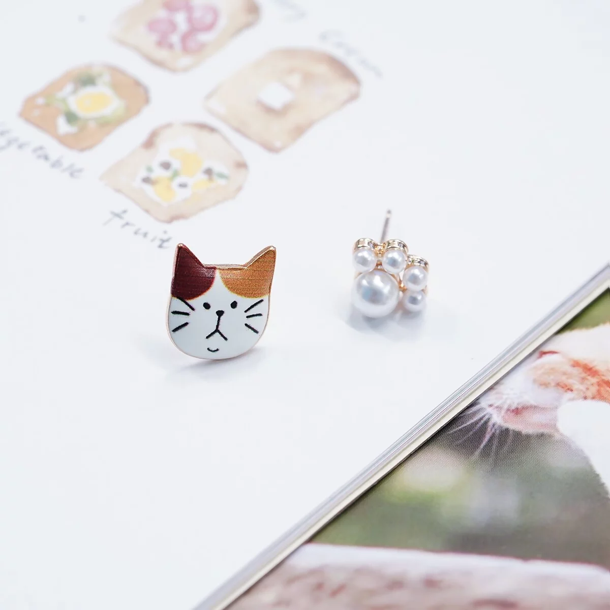 橘紋貓和珍珠肉球×不對稱耳環-第2張