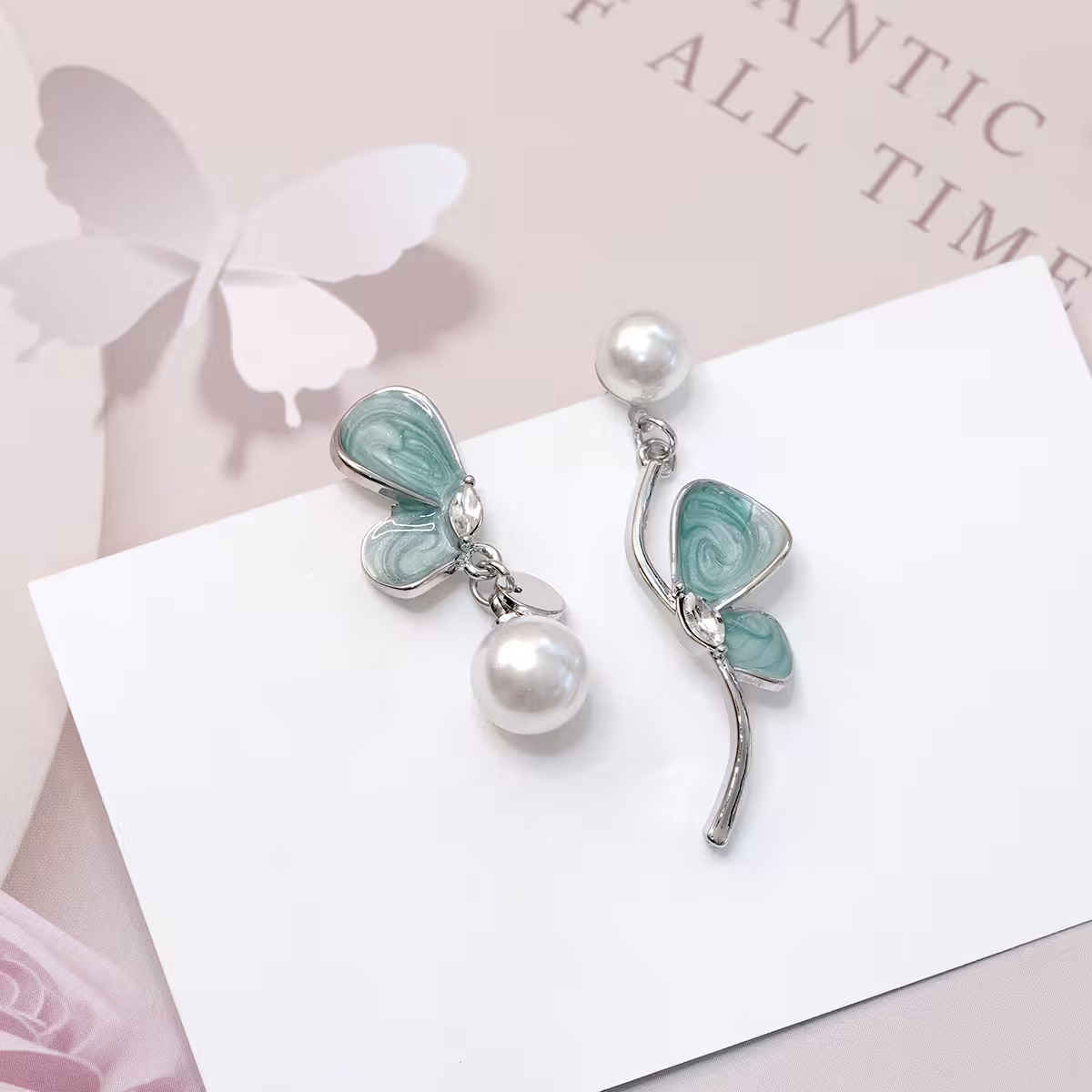 是花似蝶&times;不對稱吊墜耳環-第1張