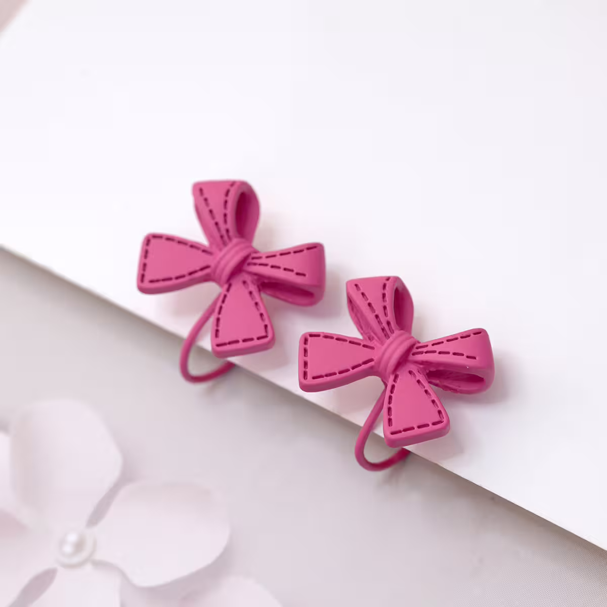 桃紅塗鴉蝴蝶結&times;蚊香盤U型耳夾-第2張