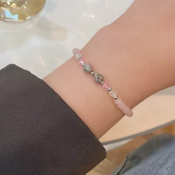 細串粉水晶愛心×固定式串珠手鍊.avif