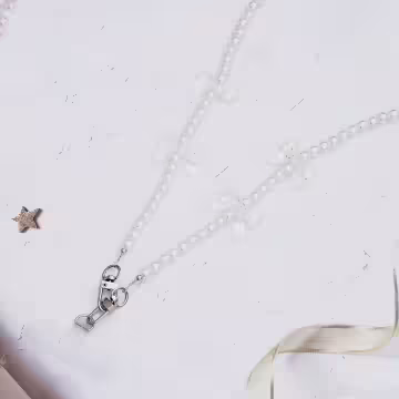 透明蝴蝶結×白色珍珠×手機斜背雙勾掛繩