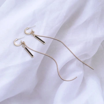 黑條一字優雅流蘇×蚊香盤U型耳夾.avif