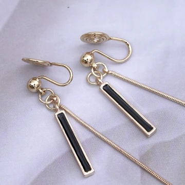 黑條一字優雅流蘇×蚊香盤U型耳夾.avif