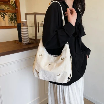 蝴蝶麂皮變形包×後背包×白色.avif