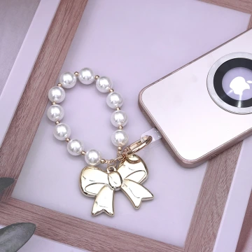超大蝴蝶結珍珠×手機掌上掛繩×金色.avif