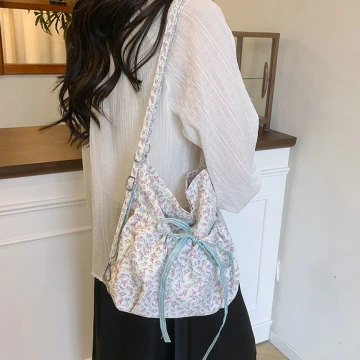 輕薄蝴蝶結小碎花×變形後背包.avif