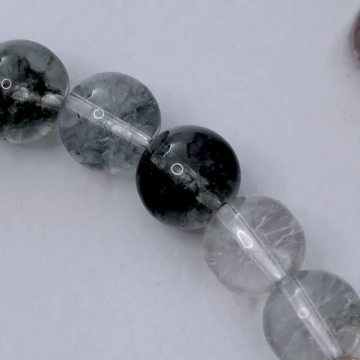桃花草莓晶&times;拉繩手鍊.avif