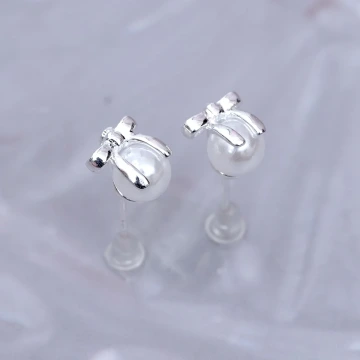 星球飛天小熊&times;不對稱吊墜耳環.avif