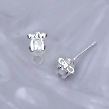 星球飛天小熊&times;不對稱吊墜耳環.avif